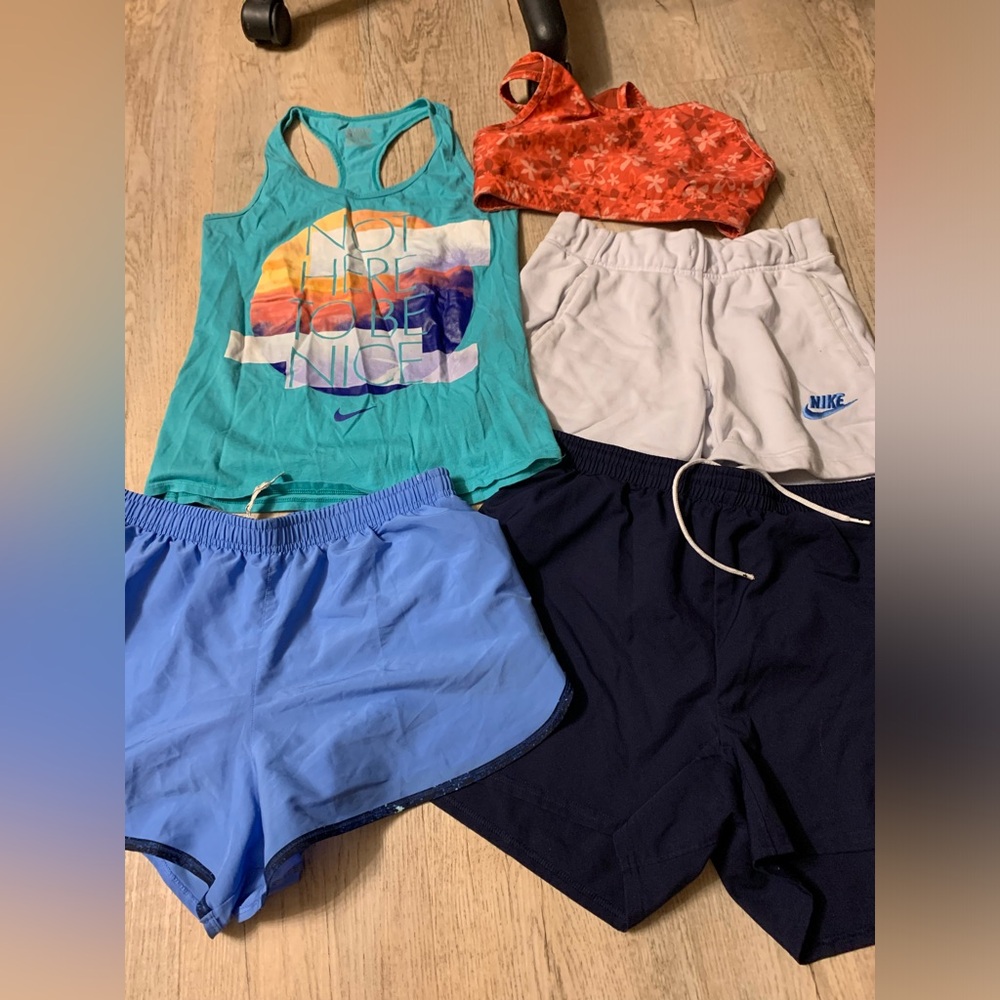 Women’s medium athletic clothing bundle- Nike, under armour shorts, tank top